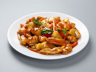 Piept de pui dulce acrisor cu risotto cremos cu curry