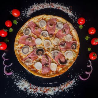 Pizza prosciutto e funghi