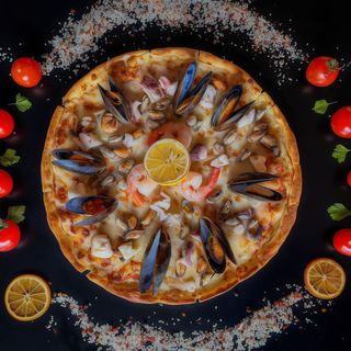 Pizza con frutti di mare