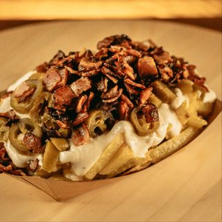 Potatoes with Cheese sauce, Bacon & Jalapenos