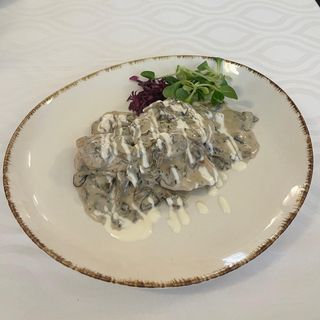 Cotlet de porc cu sos de ciuperci