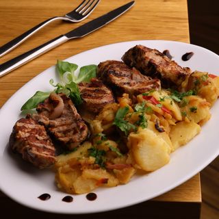 Muşchiuleţ de porc împănat-garni