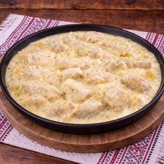 Pui în sos de brânzeturi