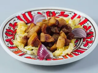 Jumari crocante de porc cu ceapa de apa 250g