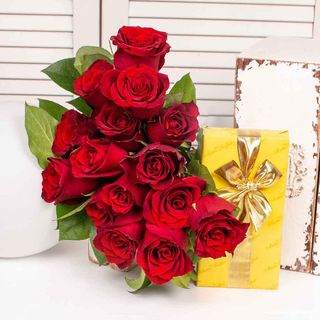 Surpriza cu trandafiri rosii si praline belgiene