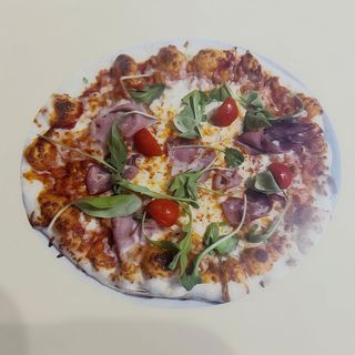 Pizza crudo e rucolla