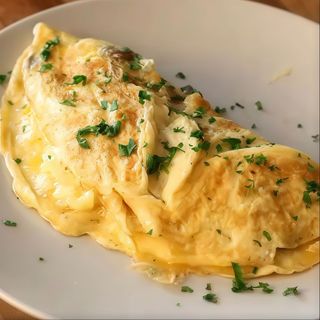 Omletă cu şuncă şi mozzarella