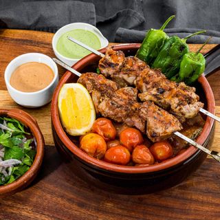 Terracotta Pot and two Pork Neck Skewers
