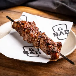 Terracotta Pot and two Pork tenderloin Skewers