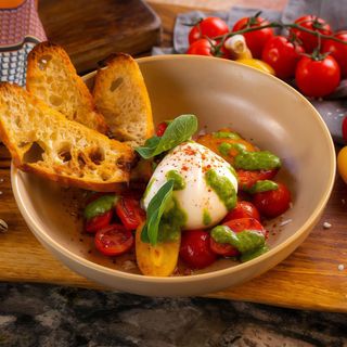 Burrata with tomatoes and pesto