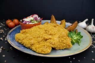 Snitel de curcan in crusta de fulgi porumb