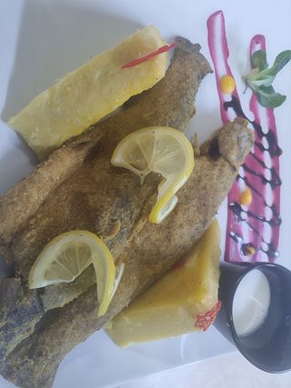 Pastrav prajit in crusta de malai