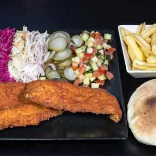 Chicken snitzel in plate