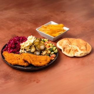 Chicken snitzel in plate