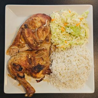 Half chicken on a plate