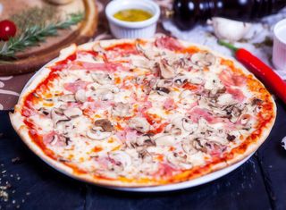 Pizza medie Prosciutto e funghi