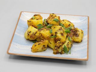 Jeera aloo with bread/lipia