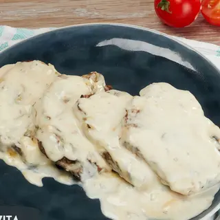 Filetto in salsa gorgonzola e pinoli