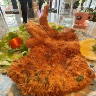 Schnitzel de porc cu mix de salata