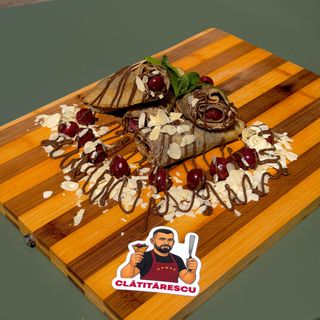 Clatita cu nutella, visine din compot si fulgi de migdale