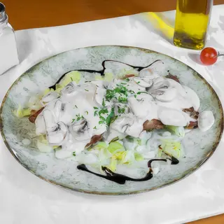 Cotlet de porc cu sos de ciuperci