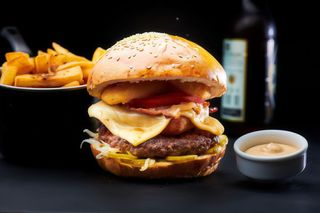 The artist with fries and sos burgatore