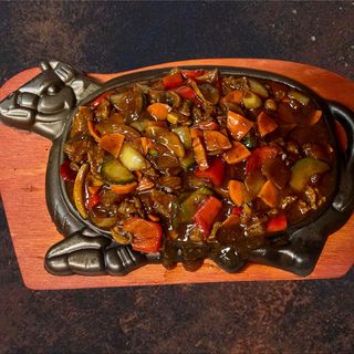 Rață pe plită încinsă