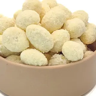 Migdale RAFFAELLO în ciocolata alba cu nuca de cocos