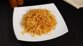 Cartofi subțiri prăjiți