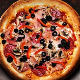 Comanda oricare pizza din meniu +1- Bere la doza Tuborg ICE sau 1-Calsberg fara alcool 0.5L