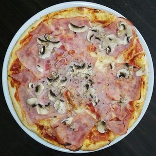 Pizza Prosciutto e funghi