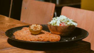 Chicken schnitzel with avocado salad
