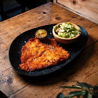 Chicken schnitzel with avocado salad