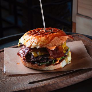 Double smash burger with tomato or red onion slices