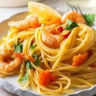 Spaghete cu creveti, rosii cherry in sos de vin alb