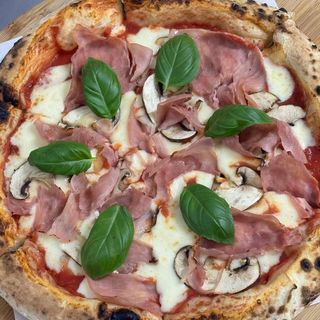 Pizza prosciutto e funghi