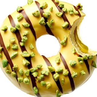 Gogoasa cu glazura de fistic, bucati de migdale si umplutura de fistic