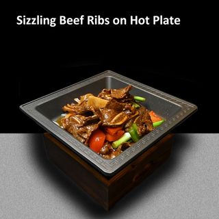 Coaste de vita pe placa incinsa 铁板牛仔骨