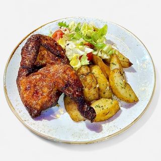 ROASTED CHICKEN WITH GARLIC POTATOES