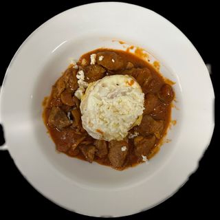 Tochitură de porc cu mămăligă