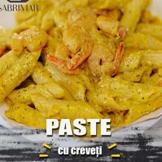 Penne cu creveti in sos de vin