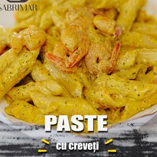 Penne cu creveti in sos de vin