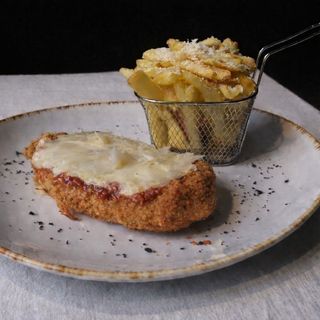 Șnițel gratinat în stil italian cu cartofi fry'n dip