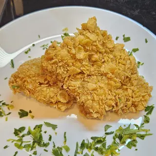 Pulpe de pui in crusta de porumb