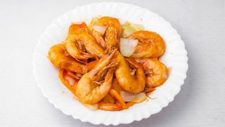 46. Škampi u slatko kiselom paradajz sosu 500 g