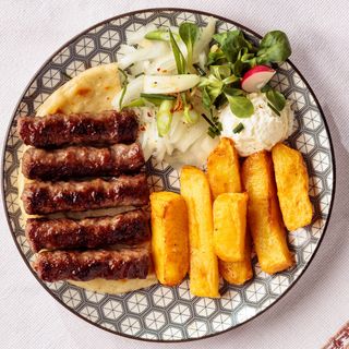 Ćevapi sa kajmakom - mala porcija 5 kom