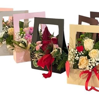 Aranžman iznenađenja u ukrasnoj kesi