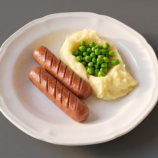 Cheese sausages with mashed potatoes and green peas