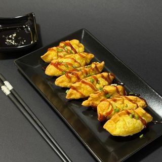 Fried salmon gyoza