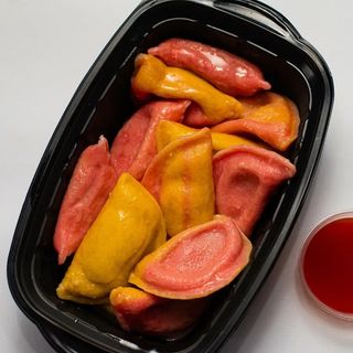 Kuvani vareniki sa rikotom i malinama